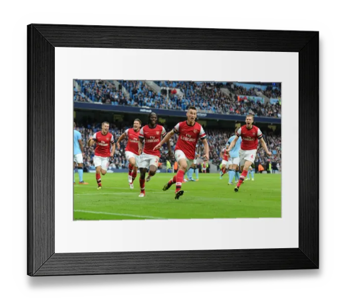 Framed Print : Arsenal's Unforgettable Goal: Koscielny, Ramsey, Gervinho, Mertesacker, and Giroud Celebrate at Etihad Stadium (Manchester City vs Arsenal, 2012) Framed Print : Arsenal's Unforgettable Goal: Koscielny, Ramsey, Gervinho, Mertesacker, and Giroud Celebrate at Etihad Stadium (Manchester City vs Arsenal, 2012)