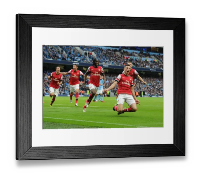 Framed Print : Arsenal's Koscielny, Giroud, Ramsey, and Gervinho: Celebrating a Goal Against Manchester City (2012-13) Framed Print : Arsenal's Koscielny, Giroud, Ramsey, and Gervinho: Celebrating a Goal Against Manchester City (2012-13)