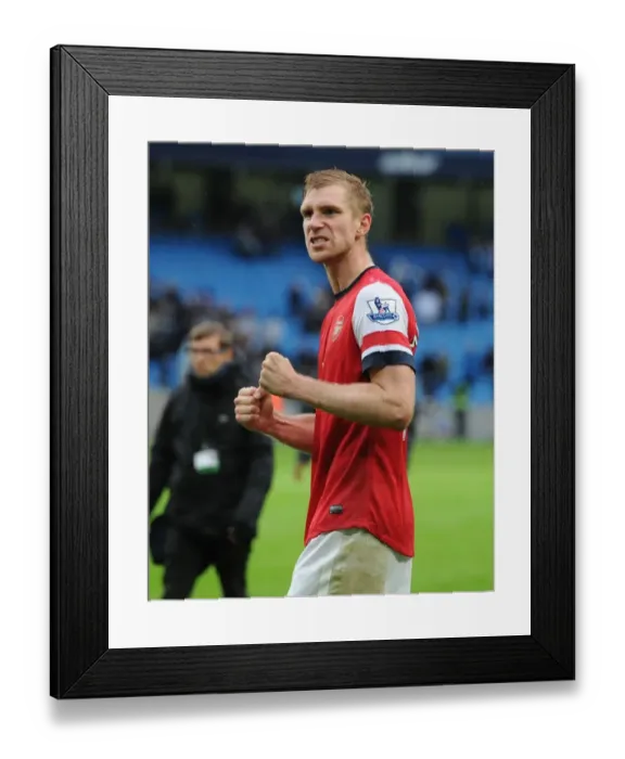 Framed Print : Per Mertesacker's Celebration: Manchester City vs. Arsenal, Premier League 2012-13