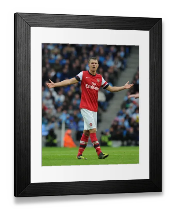 Framed Print : Aaron Ramsey in Action: Manchester City vs. Arsenal, Premier League 2012-13