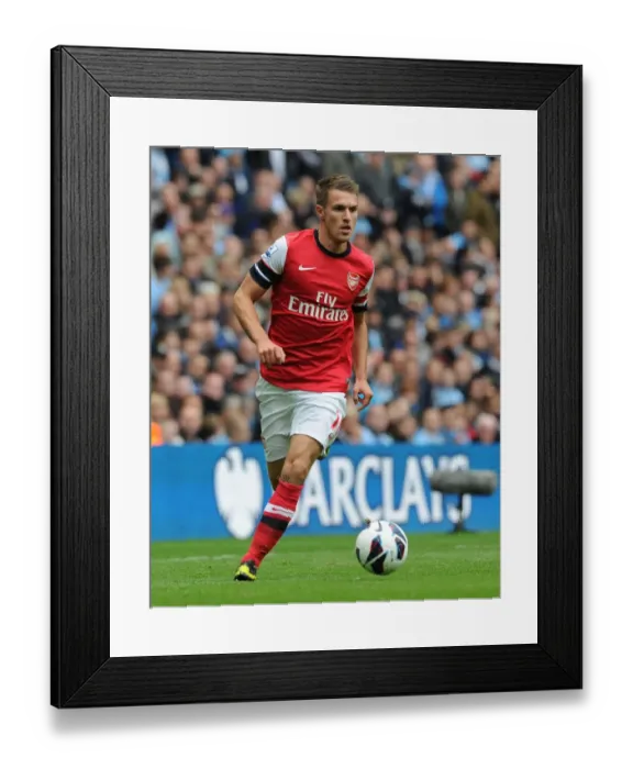 Framed Print : Aaron Ramsey in Action: Manchester City vs Arsenal, Premier League 2012-13 Framed Print : Aaron Ramsey in Action: Manchester City vs Arsenal, Premier League 2012-13
