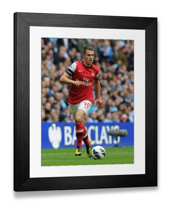 Framed Print : Aaron Ramsey in Action: Arsenal vs. Manchester City, Premier League 2012-13