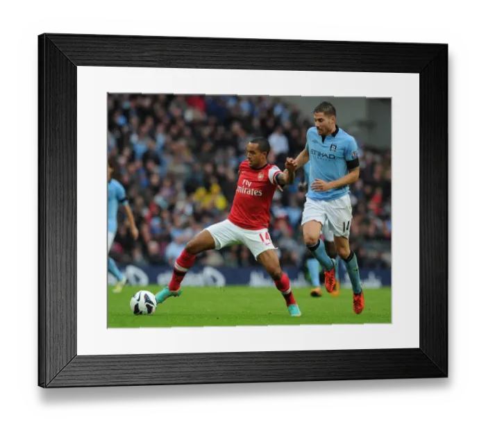 Framed Print : Theo Walcott vs. Javi Garcia: Manchester City vs. Arsenal, Premier League Showdown (2012-13) Framed Print : Theo Walcott vs. Javi Garcia: Manchester City vs. Arsenal, Premier League Showdown (2012-13)