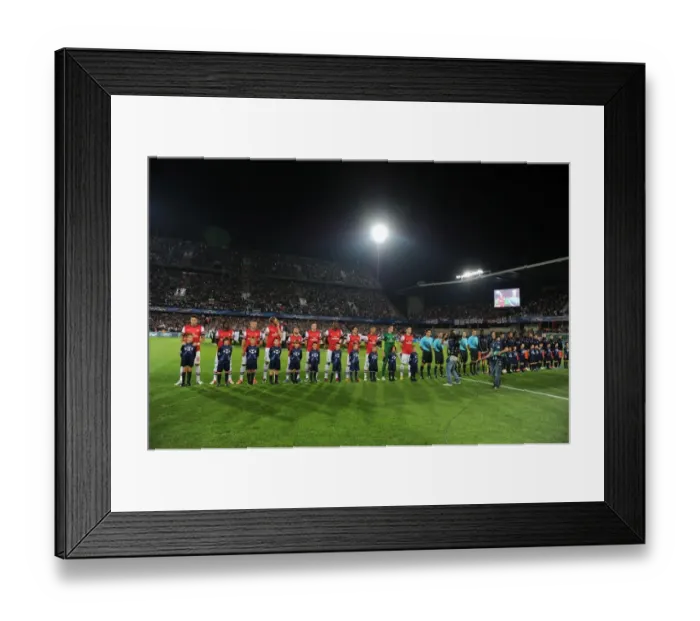 Framed Print : Arsenal vs Montpellier: UEFA Champions League Showdown (2012-13)