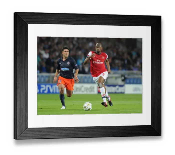 Framed Print : Abou Diaby Outmaneuvers Marco Estrada: Montpellier vs. Arsenal, UEFA Champions League, 2012 Framed Print : Abou Diaby Outmaneuvers Marco Estrada: Montpellier vs. Arsenal, UEFA Champions League, 2012