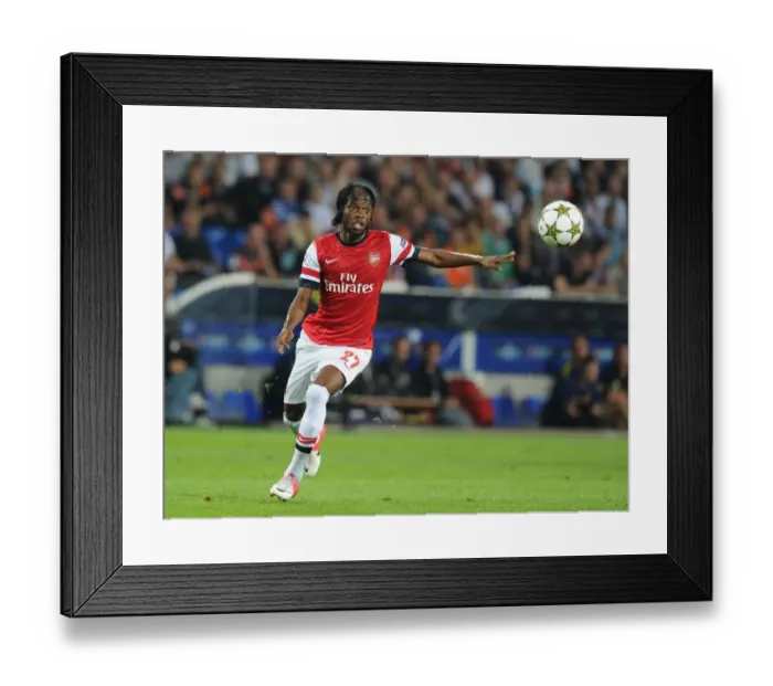 Framed Print : Gervinho in Action: Montpellier vs. Arsenal, UEFA Champions League 2012-13