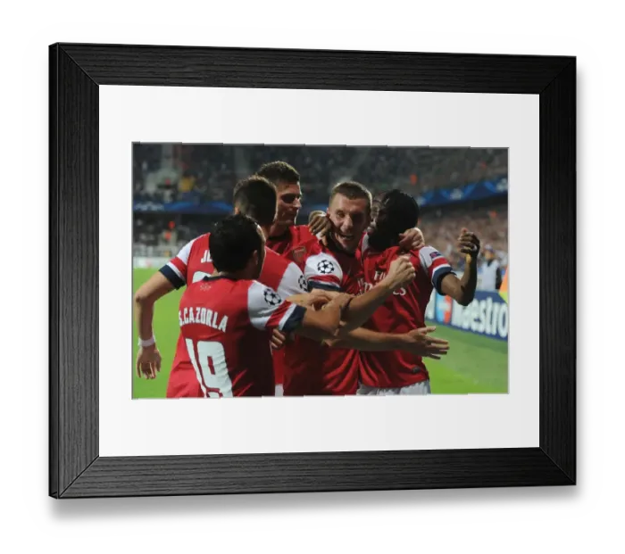 Framed Print : Arsenal's Star Players Celebrate Goals Against Montpellier in 2012-13 Champions League