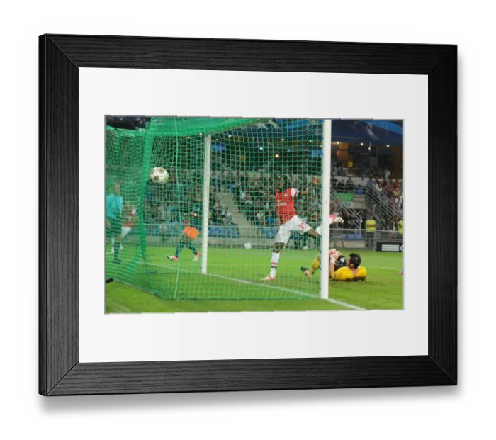 Framed Print : Gervinho's Game-Changing Goal: Arsenal's UEFA Champions League Victory Over Montpellier, 2012 - The Moment Gervinho Scores Past Jourden Framed Print : Gervinho's Game-Changing Goal: Arsenal's UEFA Champions League Victory Over Montpellier, 2012 - The Moment Gervinho Scores Past Jourden