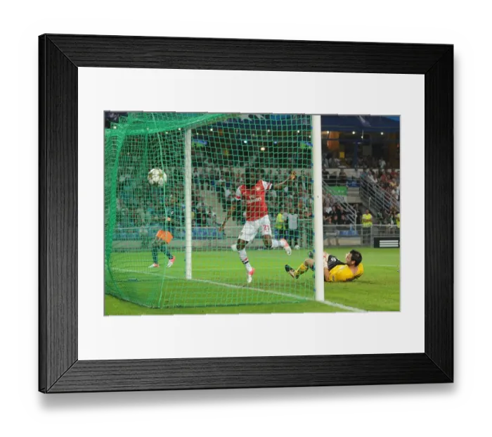 Framed Print : Gervinho Scores the Decisive Goal Past Jourden: A Turning Point in the 2012 Montpellier vs. Arsenal UEFA Champions League Clash Framed Print : Gervinho Scores the Decisive Goal Past Jourden: A Turning Point in the 2012 Montpellier vs. Arsenal UEFA Champions League Clash