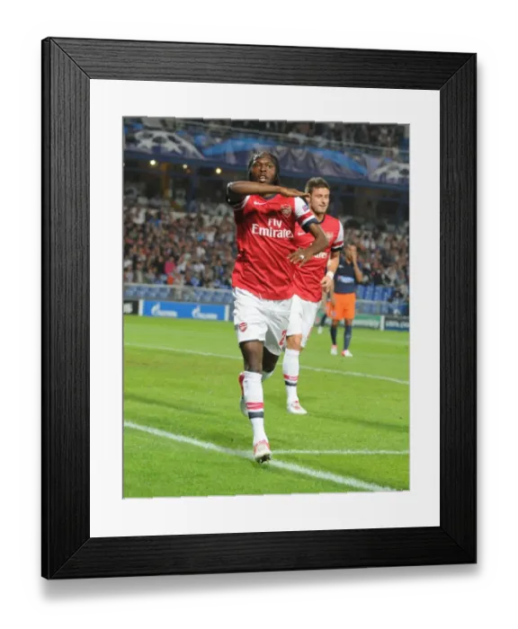 Framed Print : Gervinho's Brace: Montpellier vs. Arsenal in the UEFA Champions League (2012)