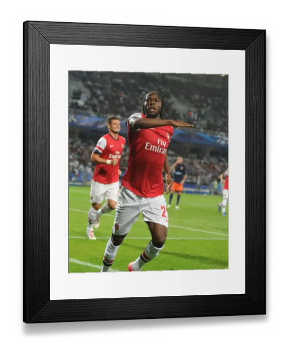 Framed Print : Gervinho Scores Arsenal's Second Goal in Champions League Clash Against Montpellier (2012-13)