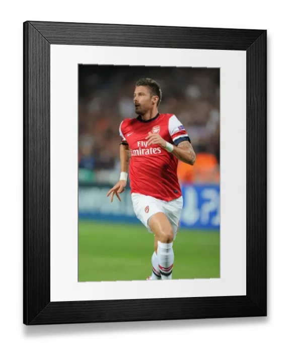 Framed Print : Olivier Giroud in Action: Montpellier vs Arsenal, UEFA Champions League 2012-13