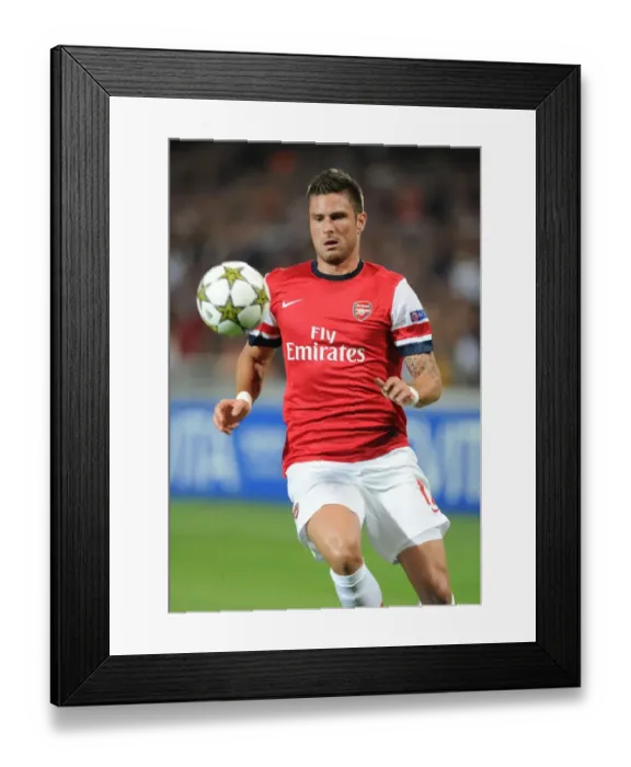 Framed Print : Olivier Giroud in Action: Montpellier vs. Arsenal, UEFA Champions League 2012-13