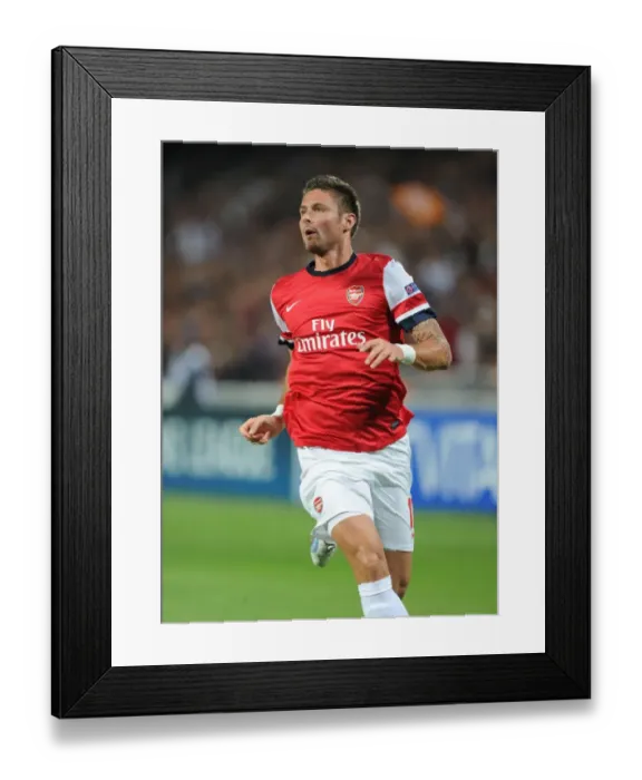 Framed Print : Olivier Giroud: In Action for Arsenal against Montpellier, UEFA Champions League 2012-13 Framed Print : Olivier Giroud: In Action for Arsenal against Montpellier, UEFA Champions League 2012-13