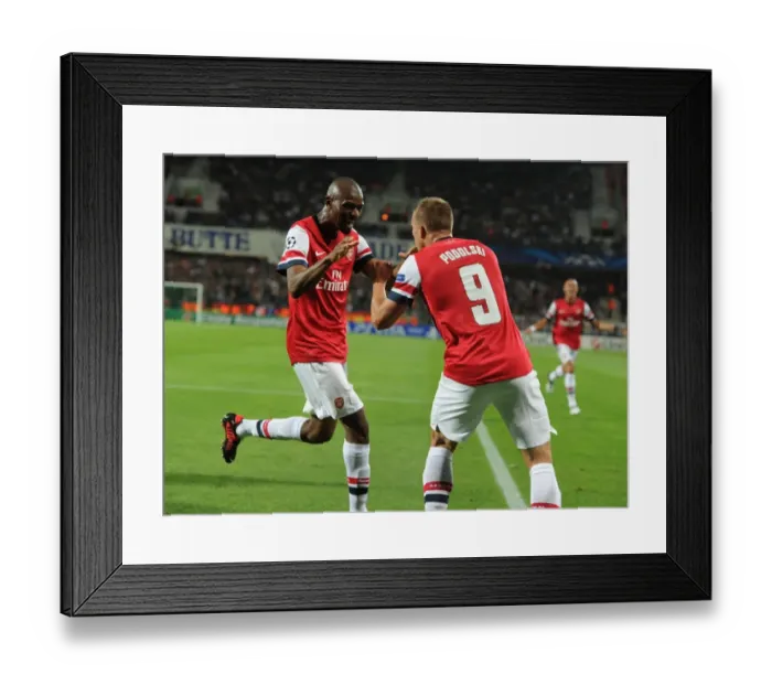 Framed Print : Arsenal's Unforgettable Goal Celebration: Podolski and Diaby's Emotional Moment (2012-13) Framed Print : Arsenal's Unforgettable Goal Celebration: Podolski and Diaby's Emotional Moment (2012-13)