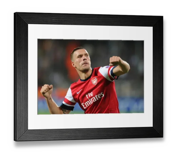 Framed Print : Lukas Podolski Scores First Arsenal Goal in UEFA Champions League Win over Montpellier (September 2012) Framed Print : Lukas Podolski Scores First Arsenal Goal in UEFA Champions League Win over Montpellier (September 2012)