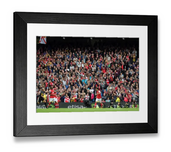 Framed Print : Arsenal fans. Manchester City 1: 1 Arsenal. Barclays Premier League. Etihad Stadium Framed Print : Arsenal fans. Manchester City 1: 1 Arsenal. Barclays Premier League. Etihad Stadium