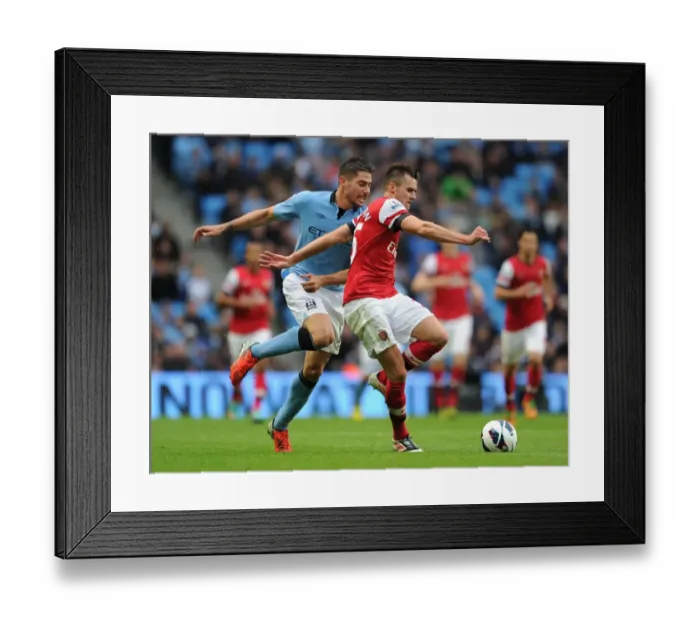 Framed Print : Manchester City vs Arsenal: Carl Jenkinson vs David Silva - 1:1 Stalemate in the Premier League Framed Print : Manchester City vs Arsenal: Carl Jenkinson vs David Silva - 1:1 Stalemate in the Premier League