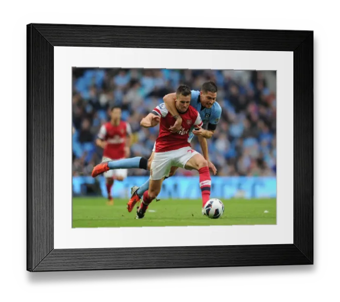 Framed Print : Jenkinson vs Garcia: A Battle at the Etihad - Manchester City vs Arsenal: 1-1 Stalemate in the Premier League Framed Print : Jenkinson vs Garcia: A Battle at the Etihad - Manchester City vs Arsenal: 1-1 Stalemate in the Premier League