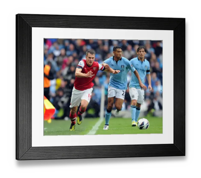 Framed Print : Ramsey vs. Clichy: Manchester City vs. Arsenal - 1:1 Stalemate in the Premier League Framed Print : Ramsey vs. Clichy: Manchester City vs. Arsenal - 1:1 Stalemate in the Premier League