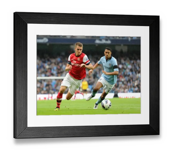 Framed Print : Ramsey vs. Clichy: A Premier League Battle - Manchester City vs. Arsenal (2012-13): 1:1 Stalemate at Etihad Stadium