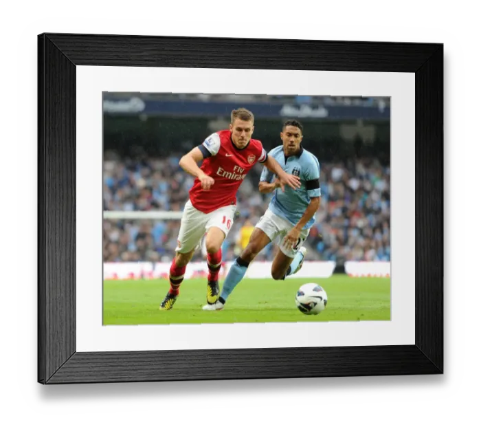 Framed Print : Intense Rivalry: Ramsey vs. Clichy - Manchester City vs. Arsenal's Thrilling 1:1 Battle in the Premier League Framed Print : Intense Rivalry: Ramsey vs. Clichy - Manchester City vs. Arsenal's Thrilling 1:1 Battle in the Premier League