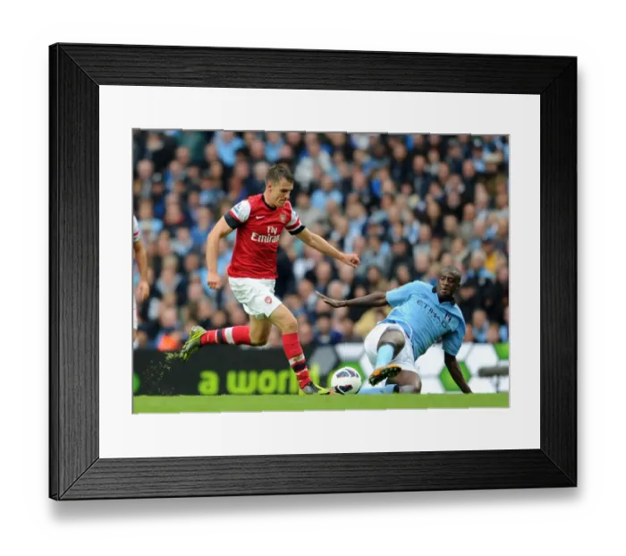 Framed Print : Ramsey vs Toure: Manchester City vs Arsenal - Premier League's Intense Draw (2012)