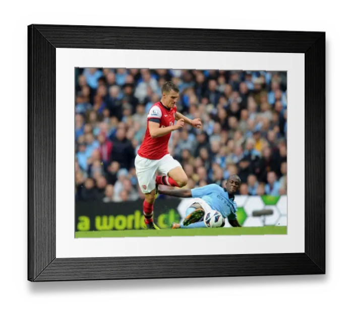 Framed Print : Intense Rivalry: Ramsey vs Toure Battle at Etihad Stadium (1:1) Framed Print : Intense Rivalry: Ramsey vs Toure Battle at Etihad Stadium (1:1)