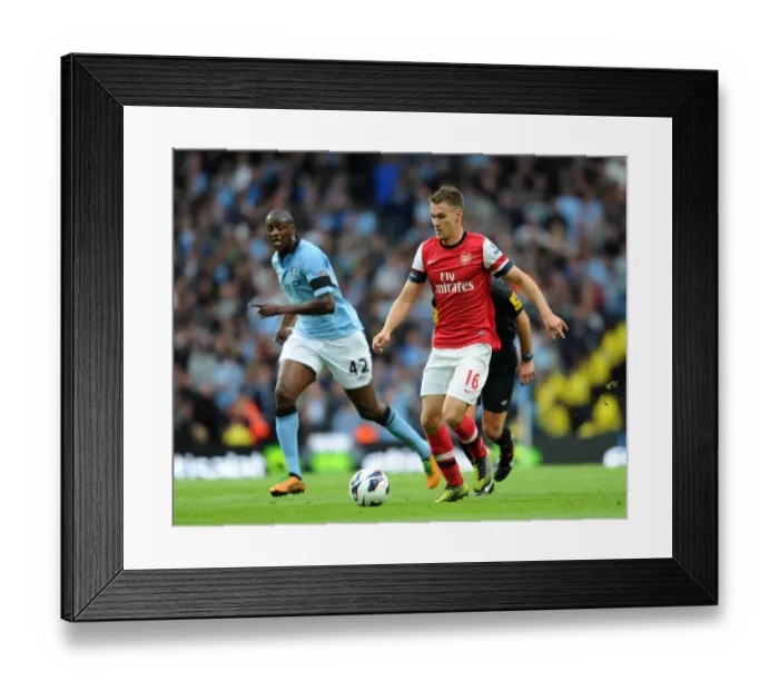 Framed Print : Aaron Ramsey (Arsenal) Yaya Toure (Man City). Manchester City 1: 1 Arsenal