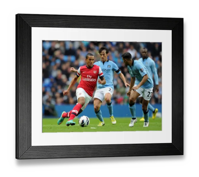 Framed Print : Manchester City vs Arsenal: Walcott vs Silva - Premier League's Intense Rivalry (1-1)