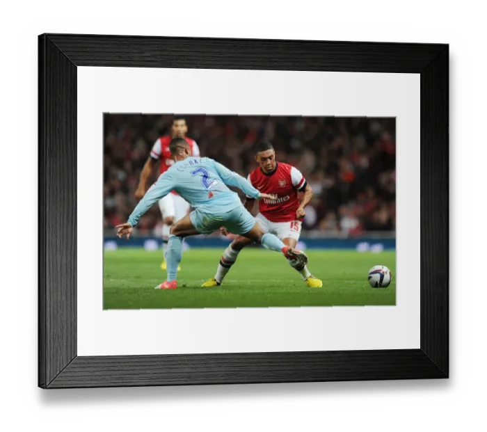 Framed Print : Arsenal's Oxlade-Chamberlain Scores Past Coventry in Capital One Cup Clash Framed Print : Arsenal's Oxlade-Chamberlain Scores Past Coventry in Capital One Cup Clash
