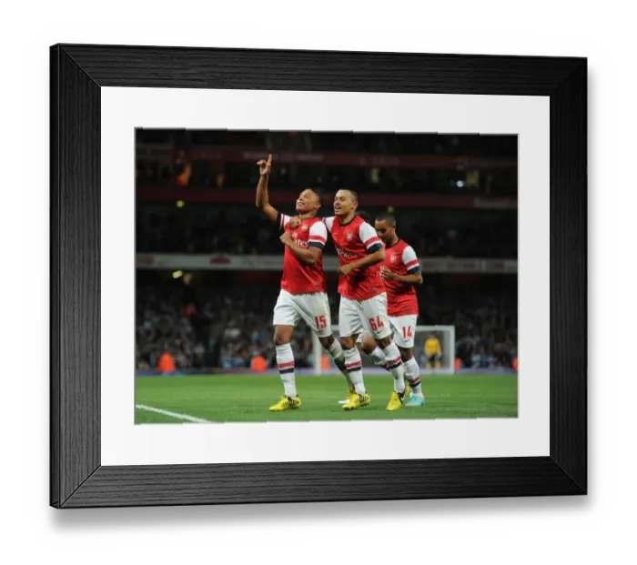 Framed Print : Arsenal's Oxlade-Chamberlain Scores in Capital One Cup Win vs Coventry City