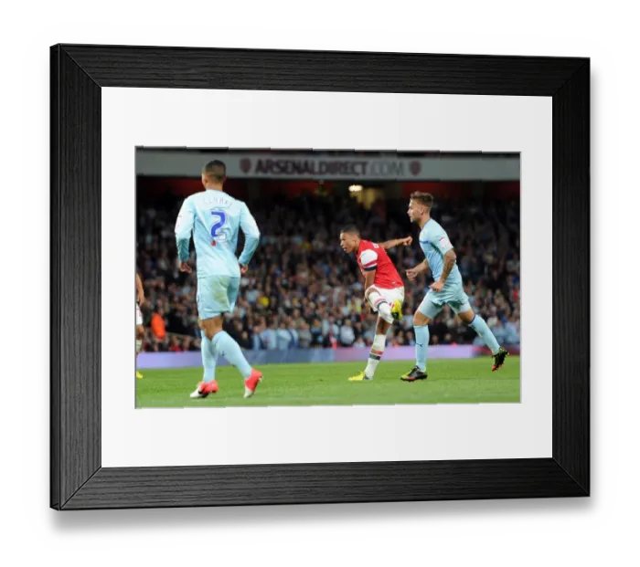 Framed Print : Alex Oxlade-Chamberlain Scores Arsenal's Second Goal Against Coventry City (2012-13) Framed Print : Alex Oxlade-Chamberlain Scores Arsenal's Second Goal Against Coventry City (2012-13)