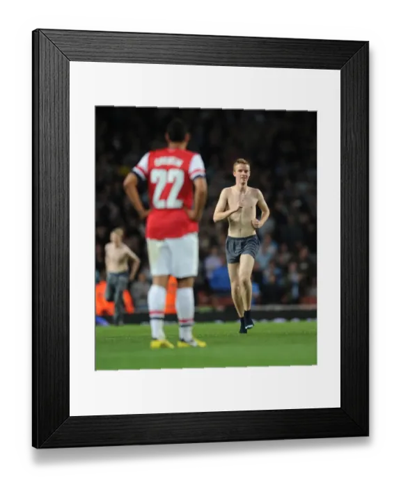 Framed Print : Fan Storms Arsenal Pitch During Capital One Cup Match vs Coventry City Framed Print : Fan Storms Arsenal Pitch During Capital One Cup Match vs Coventry City
