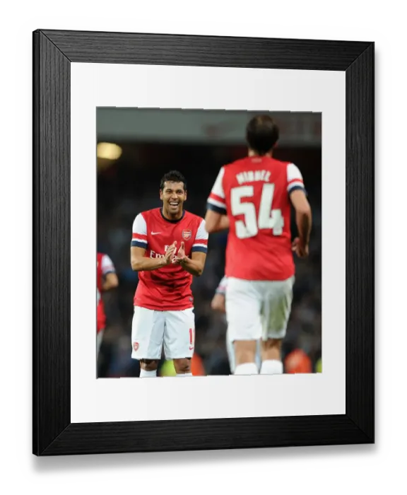 Framed Print : Arsenal's Santos and Miquel Celebrate Fifth Goal Against Coventry City (Capital One Cup 2012-13)