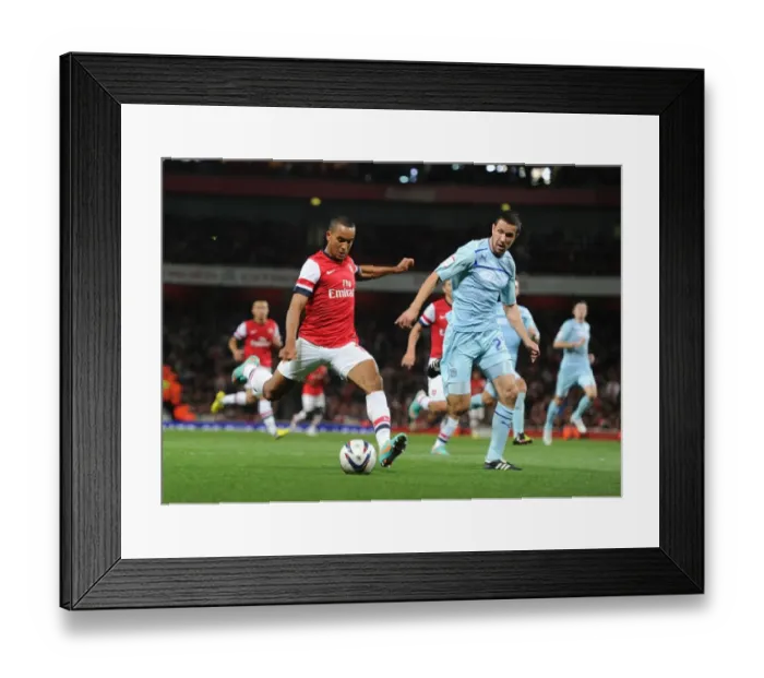 Framed Print : Theo Walcott's Brace: Arsenal Cruise Past Coventry City in Capital One Cup