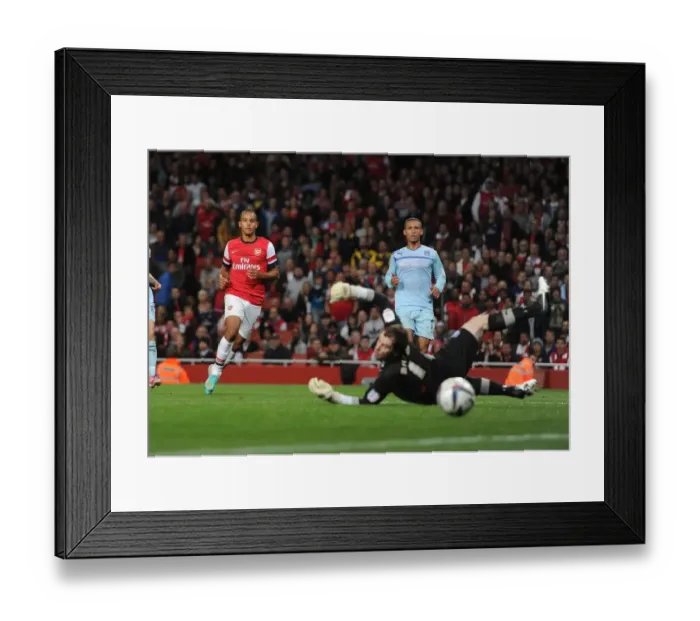 Framed Print : Theo Walcott's Brace: Arsenal's Thrashing of Coventry City in Capital One Cup
