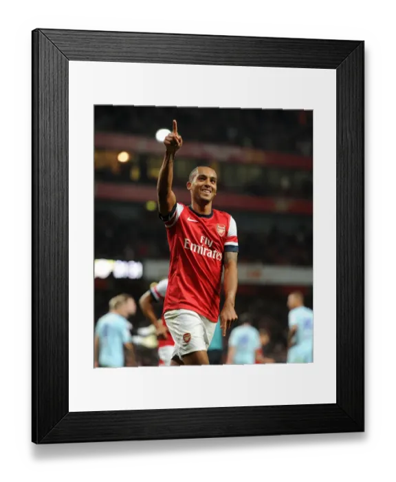Framed Print : Theo Walcott's Brace: Arsenal Overpowers Coventry City in Capital One Cup