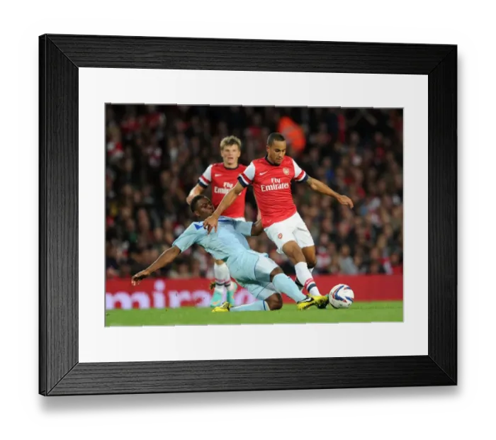 Framed Print : Theo Walcott's Hat-Trick: Arsenal Crushes Coventry City 6-1 in Capital One Cup