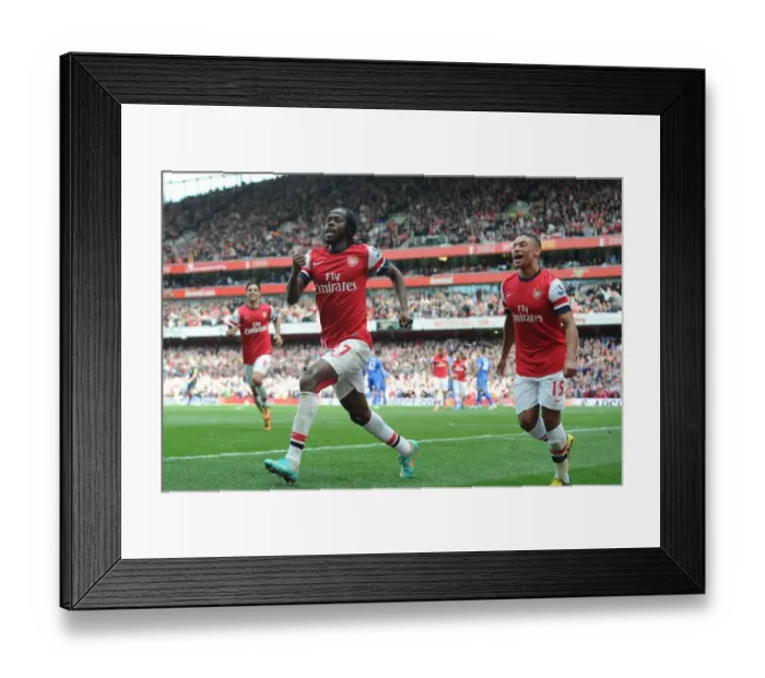 Framed Print : Arsenal: Gervinho and Oxlade-Chamberlain Celebrate Goal Against Chelsea (2012-13) Framed Print : Arsenal: Gervinho and Oxlade-Chamberlain Celebrate Goal Against Chelsea (2012-13)