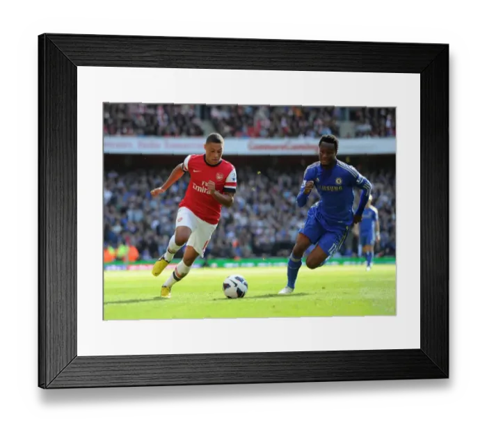 Framed Print : Arsenal vs Chelsea: Oxlade-Chamberlain vs Mikel - Premier League Showdown Framed Print : Arsenal vs Chelsea: Oxlade-Chamberlain vs Mikel - Premier League Showdown