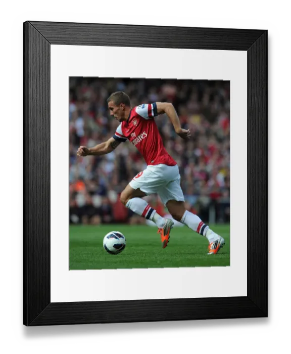 Framed Print : Arsenal's Lukas Podolski Faces Off Against Chelsea in the Premier League Framed Print : Arsenal's Lukas Podolski Faces Off Against Chelsea in the Premier League