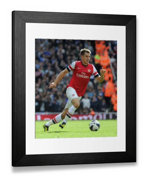 Framed Print : Arsenal's Aaron Ramsey Faces Off Against Chelsea in Premier League Showdown (2012-13)