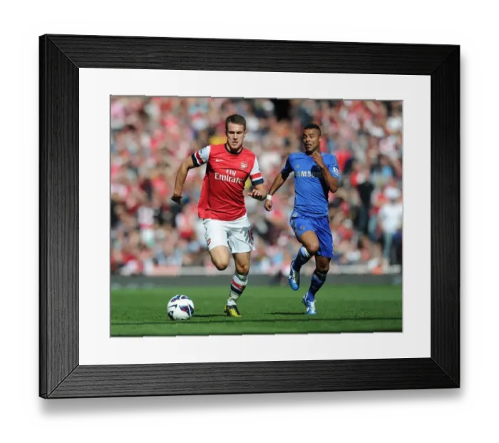 Framed Print : Arsenal's Aaron Ramsey Outmaneuvers Chelsea's Ashley Cole Framed Print : Arsenal's Aaron Ramsey Outmaneuvers Chelsea's Ashley Cole
