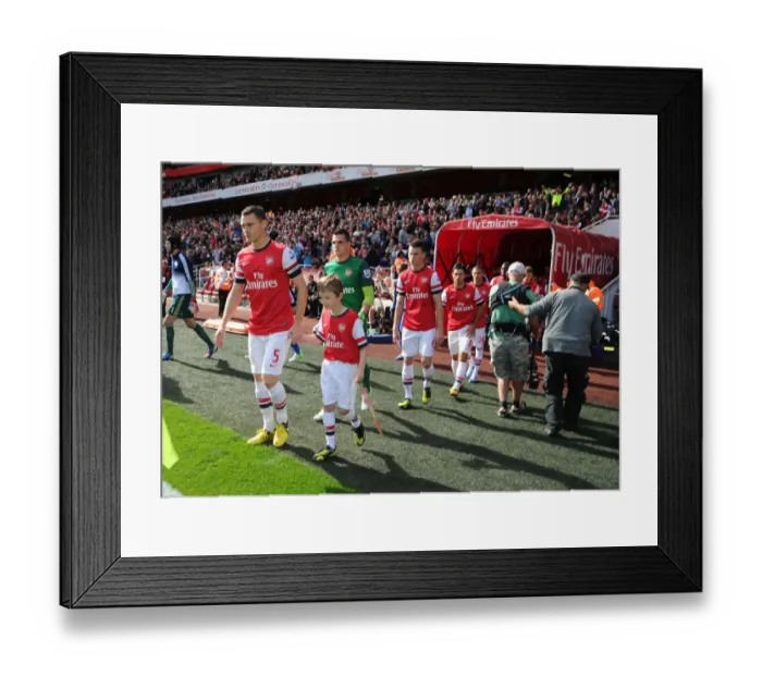 Framed Print : Arsenal vs Chelsea: Thomas Vermaelen Leads The Gunners Out at Emirates Stadium (2012-13) Framed Print : Arsenal vs Chelsea: Thomas Vermaelen Leads The Gunners Out at Emirates Stadium (2012-13)