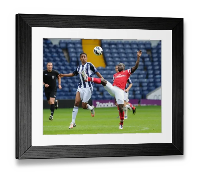 Framed Print : Emmanuel Frimpong vs Mani O Sullivan: Intense Battle in Arsenal U21 vs West Bromwich Albion U21 (2012-13) Framed Print : Emmanuel Frimpong vs Mani O Sullivan: Intense Battle in Arsenal U21 vs West Bromwich Albion U21 (2012-13)