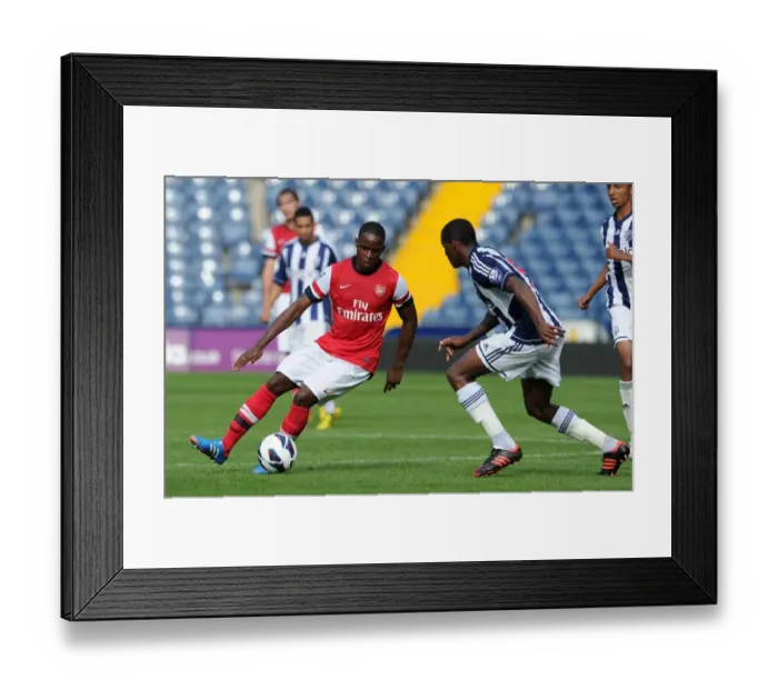Framed Print : Nigel Neita (Arsenal) Donervorn Daniels (WBA). West Bromwich Albion U21 1: 0 Arsenal U21