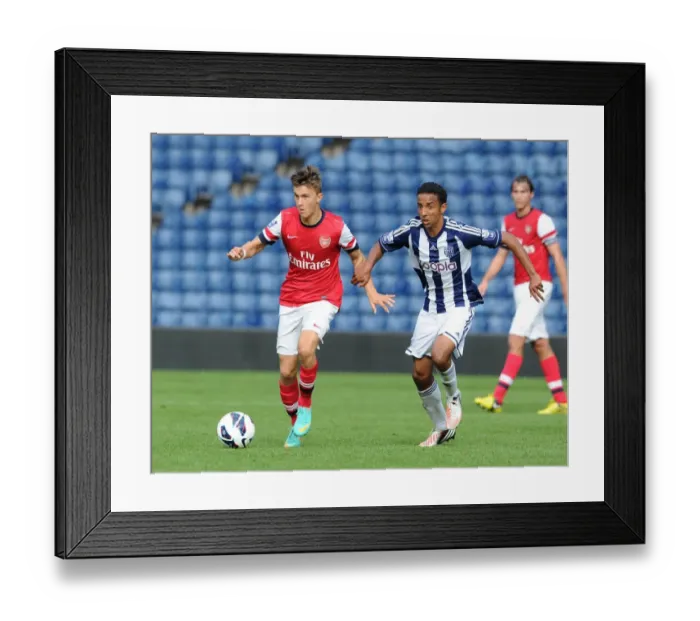 Framed Print : Kris Olsson (Arsenal) Mani O Sullivan (WBA). West Bromwich Albion U21 1: 0 Arsenal U21