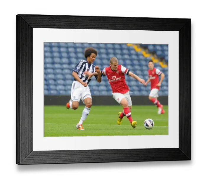 Framed Print : Jack Wilshere vs. Isiah Brown: Clash of the Young Talents in Arsenal U21 vs. West Bromwich Albion U21 (2012-13) Framed Print : Jack Wilshere vs. Isiah Brown: Clash of the Young Talents in Arsenal U21 vs. West Bromwich Albion U21 (2012-13)
