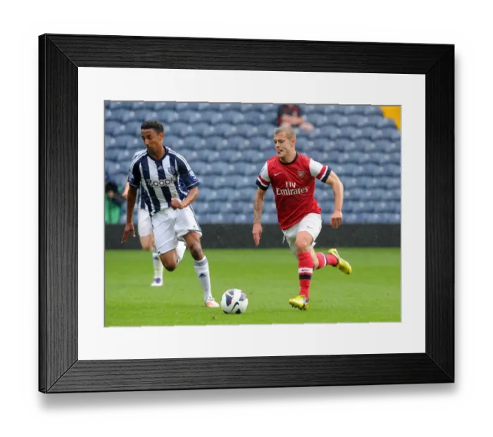 Framed Print : Jack Wilshere vs Mani O'Sullivan: Clash of the Young Talents in Arsenal U21 vs West Bromwich Albion U21 (2012-13) Framed Print : Jack Wilshere vs Mani O'Sullivan: Clash of the Young Talents in Arsenal U21 vs West Bromwich Albion U21 (2012-13)